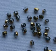 Glasschliffperle 3mm AB bedampft gold/anthrazit100 Stück (Restbestand)